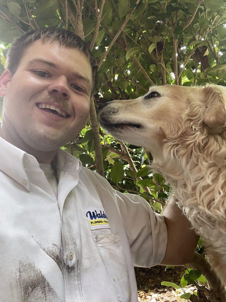 Tech with golden retriever