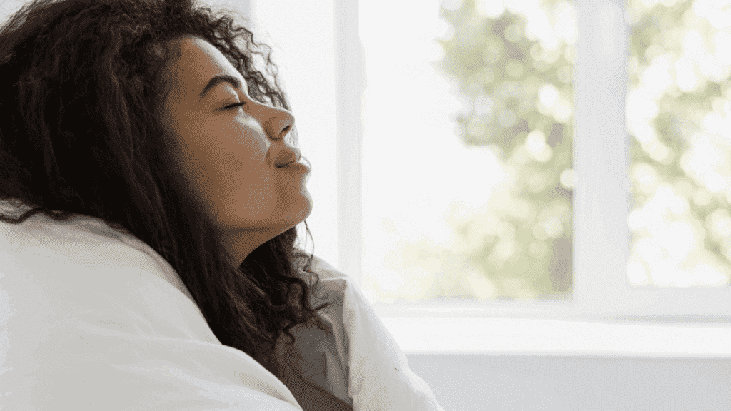 woman breathing in air