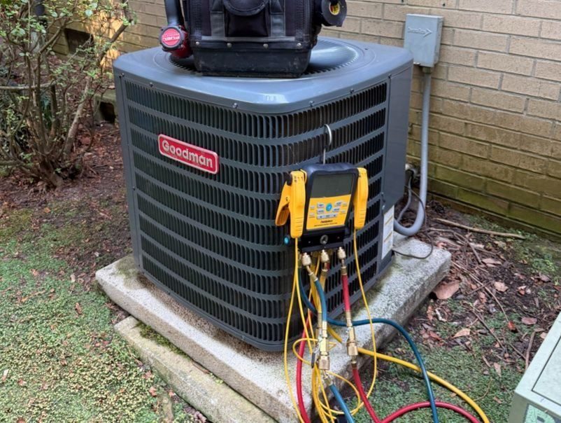 Air conditioning unit being inspected before repaired.