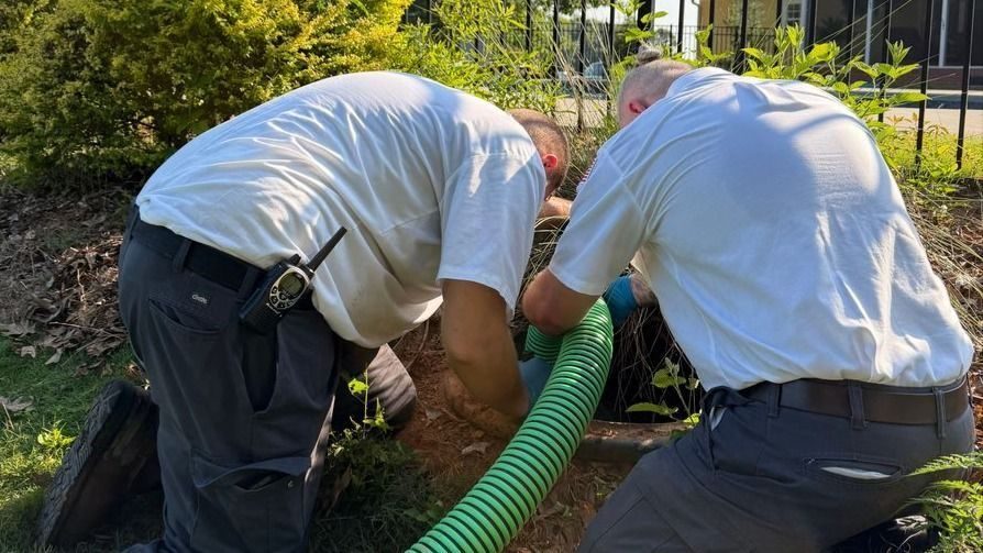 Waldrop plumbers doing septic service for a home