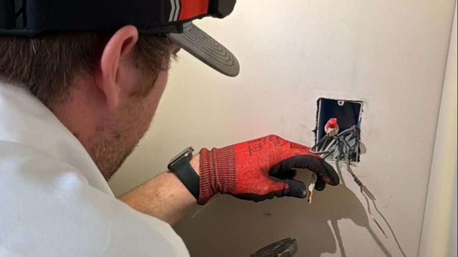 Waldrop electrician working on wiring